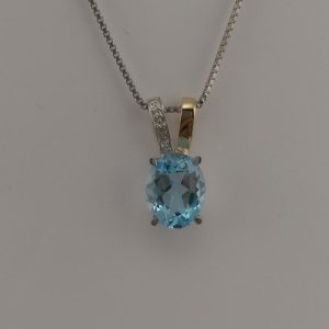 9ct White and Yellow Gold Blue Topaz and Diamond pendant and chain-910