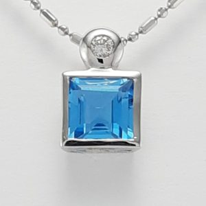 18ct White Gold Blue Topaz and Diamond Pendant on Chain-1449